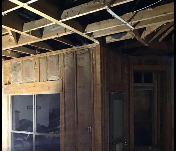 Ceiling and drywall has been removed due to electrical fire